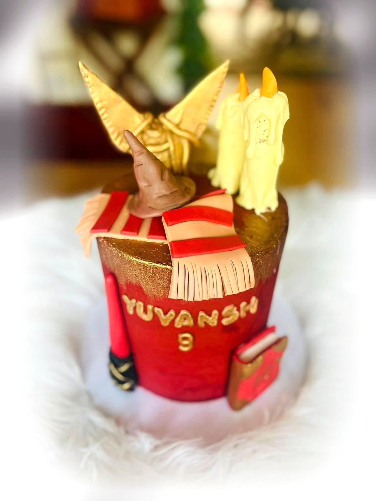 Wizarding Book Birthday Cake by SpongyBakes — A sculpted spellbook cake with a hat, candles and hand-painted detailing.